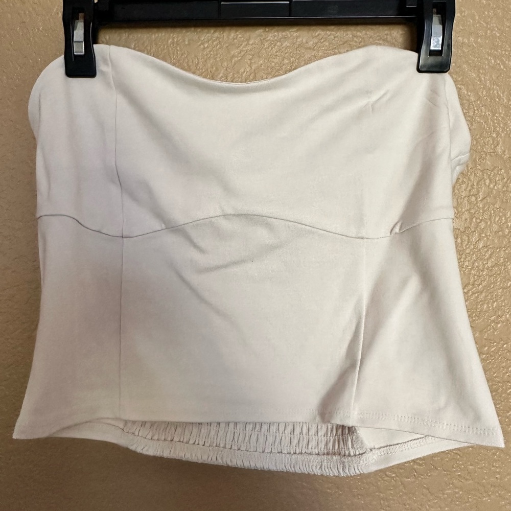 Cream Tube top with schmuck back.